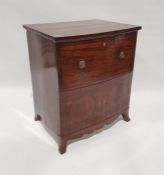 19th century mahogany commode converted to a television cabinet with lion mask handles, on swept