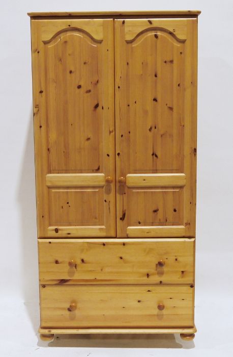 Pair of 20th century pine wardrobes with two cupboard doors and two drawers under, on squat bun feet - Image 2 of 10