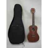 Kala ukulele, guitar-shaped, in case