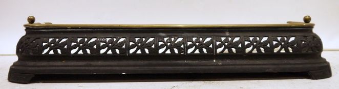 Brass and iron late Victorian fire curb with pierced foliate panels raised on bracket feet, 80cm x