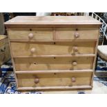 19th century pine chest of two short over three long drawers with moulded edge and plinth base (
