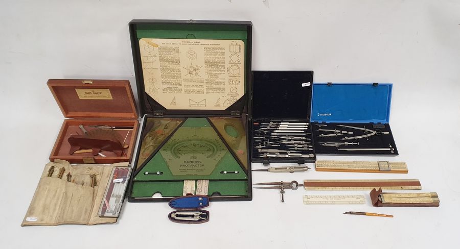 Army & Navy geometry set in black japanned metal case, sundry geometry instruments and rulers and an