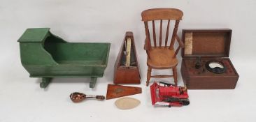 Old green painted doll's wooden rocking cradle, 31cm long, doll's wooden miniature Windsor armchair,