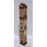 CD tower painted in form of a townhouse