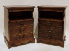 Two 20th century mahogany bedside tables with rectangular tops, moulded edges, slide, open recess,