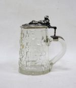 19th century cut glass tankard with silver coloured metal hinged lid, the thumbpiece in the form