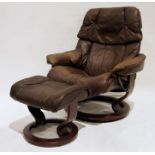 Ekornes brown leather reclining armchair and two footstools (3)  Condition Reportthe chair has had a