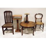 20th century mahogany circular table on cabriole legs, two oak slat back 20th century chairs, a