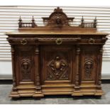 Victorian mahogany Renaissance revival sideboard, the back board with carved jester's mask
