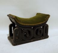 Black stained hardwood seat with dished top, on carved base, 49cm x 31cm Condition ReportExtra