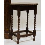 20th century oak circular seated stool, turned block supports, together with oak occasional table,