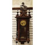 Mahogany and ebonised Vienna-style wall clock with rearing horse surmount flanked by pair urns,