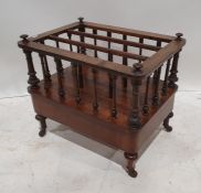 Victorian walnut and inlaid Canterbury of three sections, united by spindles, the whole on turned