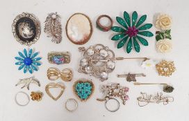 Collection of costume jewellery, including enamelled and paste set brooches, a simulated cameo