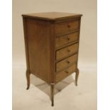Mahogany bedside chest of four drawers on French cabriole supports brass hoof feet (one missing) (