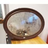 Oval mirror in moulded frame