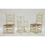 Pair of white painted ladderback rush-seated childs chairs and one further (3)