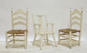 Pair of white painted ladderback rush-seated childs chairs and one further (3)