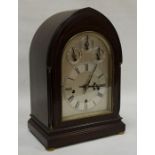 Late 19th / early 20th century mahogany cased bracket clock of lancet form, the chiming mechanism on