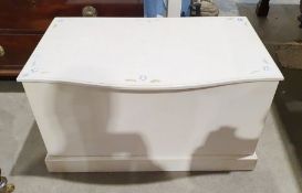 White painted wooden blanket box with painted floral decoration to lid.