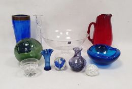 Collection of coloured glassware, 20th century, including two paperweights, one enclosing blue