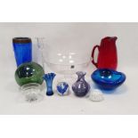 Collection of coloured glassware, 20th century, including two paperweights, one enclosing blue