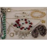 Quantity of costume jewellery including a rose quartz pendant, a glass bead necklace, a paste
