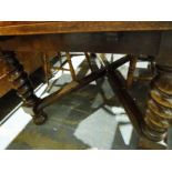 Edwardian oak draw-leaf table with barleytwist and block supports, X-shaped stretchered base