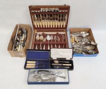 Collection of assorted flatware, including bone handled sets,  serving spoons, forks and carvers, an