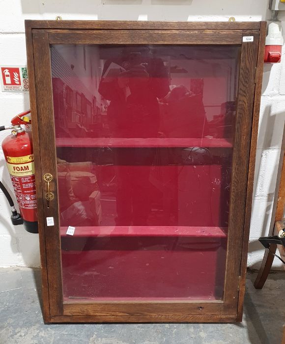 20th century oak-framed wall-hanging display cabinet with single glazed door, shelved interior, 82.