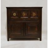 Reproduction oak side cabinet with vertical fall-flap above cupboard enclosed by pair framed panel