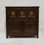 Reproduction oak side cabinet with vertical fall-flap above cupboard enclosed by pair framed panel