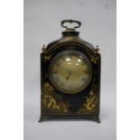 20th century Mappin & Webb mantel clock in chionoiserie black ground case, with brass carry