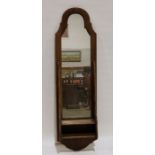 20th century mahogany shaped mirror with shelf under