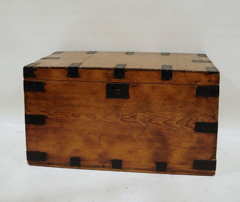 Pine and metal-bound trunk, 90cm x 50cm  Condition Report Scratches, dents and wear throughout.