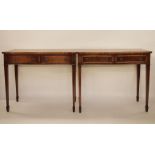 Pair of modern serpentine-fronted two-drawer hall tables, on square section tapering supports to