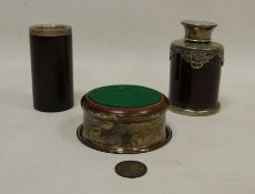 Silver mounted wooden wine coaster, silver mounted cylindrical pencil holder, an Edwardian silver
