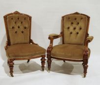 Pair of Victorian walnut lady's and gentleman's buttonback chairs on supports and castors (2)