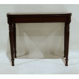 Victorian mahogany card table, the rectangular top with rounded front corners opening to reveal