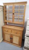 Pine glazed dresser with glazed cabinet top, cupboards bellow on plinth base (106x44x199cm)