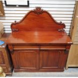 19th century mahogany chiffoniere, the moulded back above rectangular top with two drawers, two