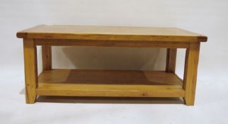 Modern oak two-tier rectangular coffee table on block supports, 120cm x 48cm