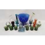 Collection of coloured glassware including three Wedgwood Sheringham candlestick holders designed by