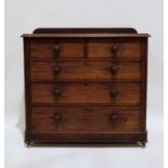 Late 19th century mahogany chest of two short over three long drawers, the rectangular top with