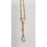 9ct gold, opal and seedpearl pendant and chain, the pendant set two tear-shaped opals centred by