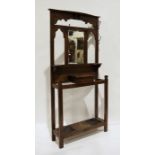 20th century oak hall stand with coat hooks, mirrored back, glove box, umbrella stick stand under,