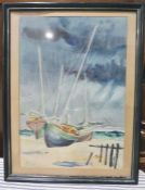 A watercolour of boats moored on a beach, signed Stanton lower left, along with a collection of