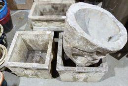 Pair of square composite stone flower pots with moulded lion head decoration and another (3)
