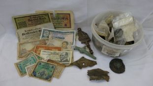 Collection of excavated items from a farm including coins, barrel tap, buttons etc.  1914 - 19323