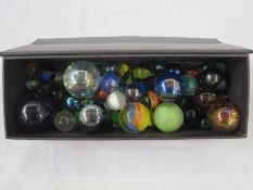 Collection of approximately 60 marbles of various sizes and age